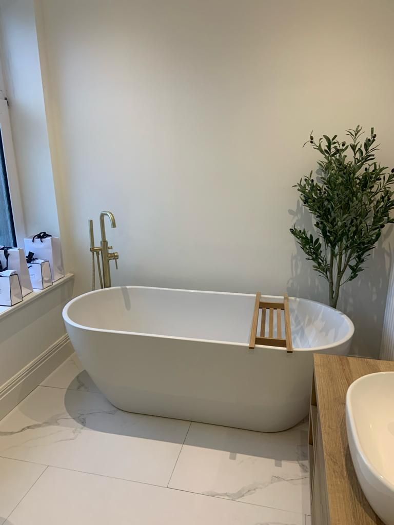 Freestanding bath in a completed bathroom